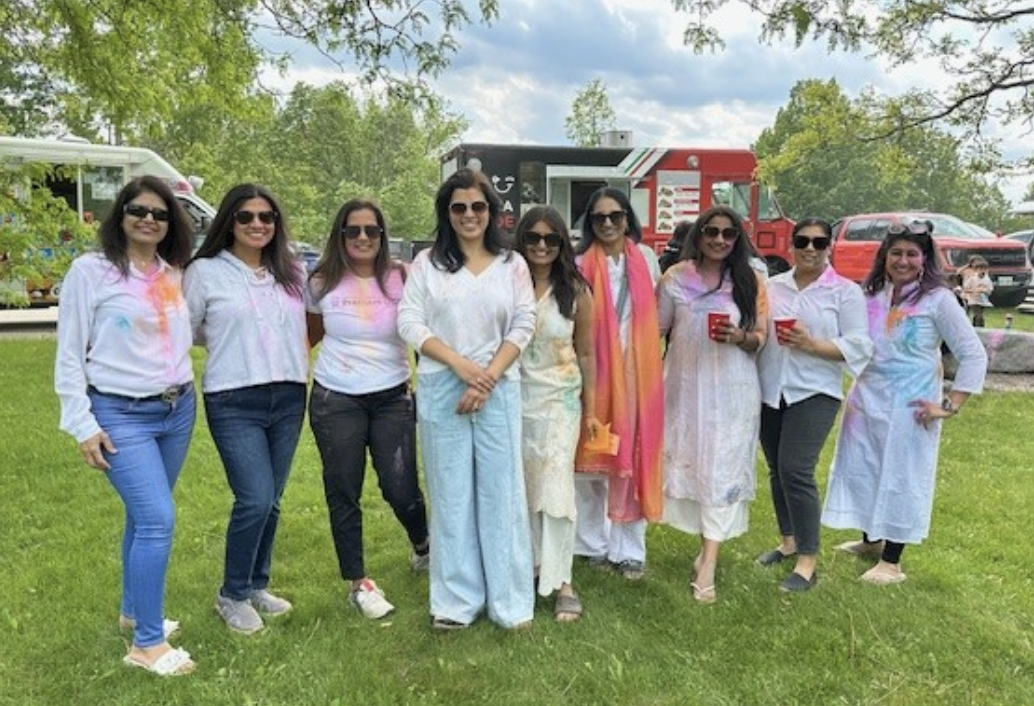 Pictured: Far left Trustee Dr. H. Patel and friends at Holi Festival